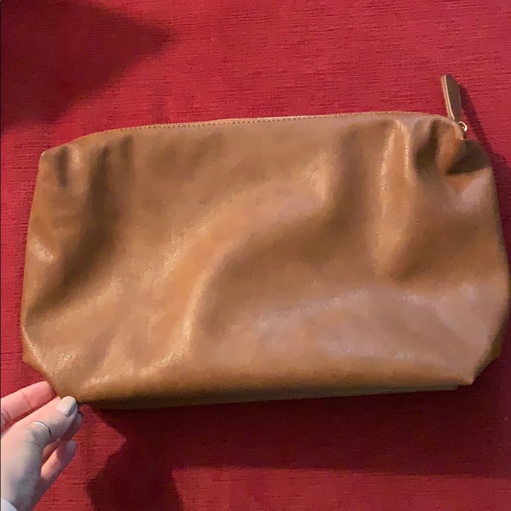 Brown handless faux leather bag